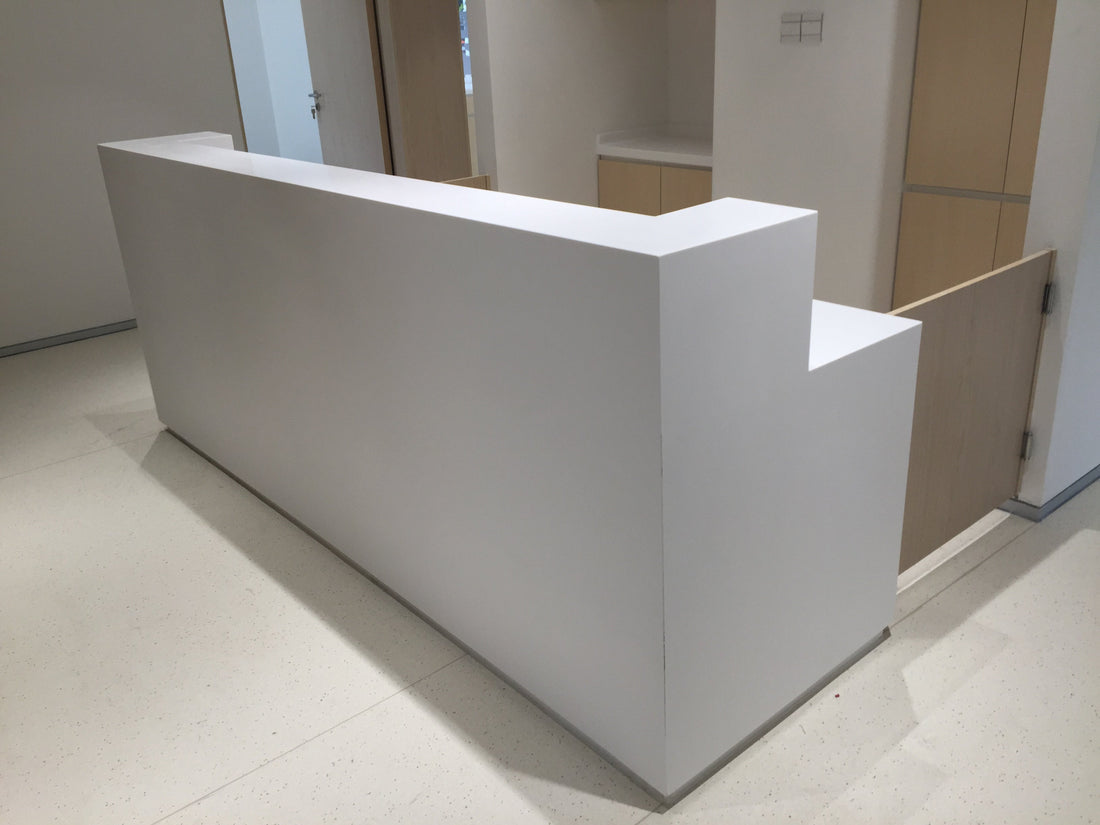 Acrylic Solid Surface vs HPL for Reception Desks