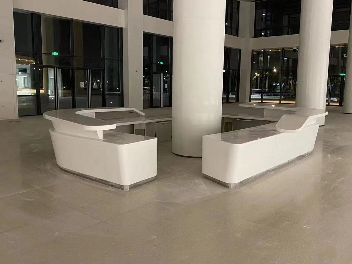 Two white service-counter forms in a lobby setting