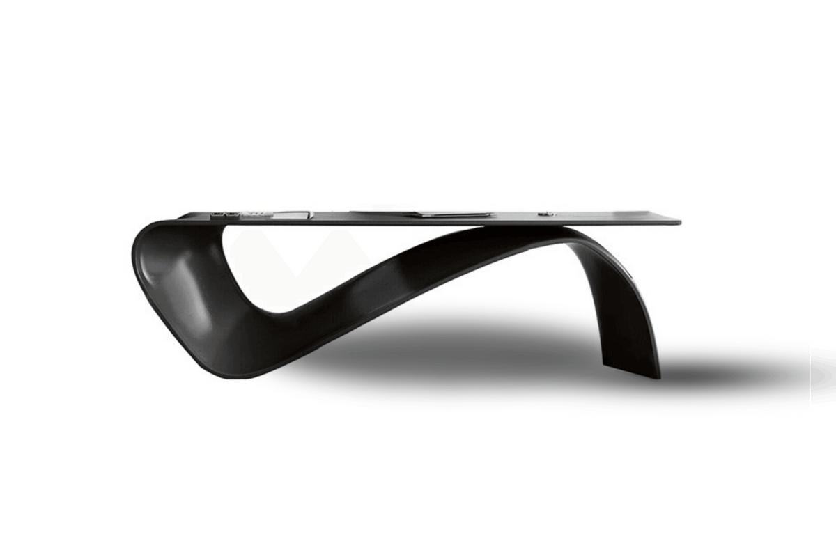 Side view of black shaped solid surface manager table for executive offices with seamless acrylic solid surface finish