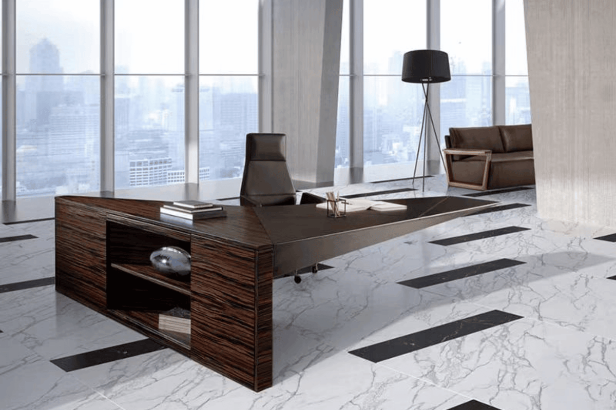 Side view of floating triangle solid surface executive desk for design offices with seamless acrylic solid surface finish