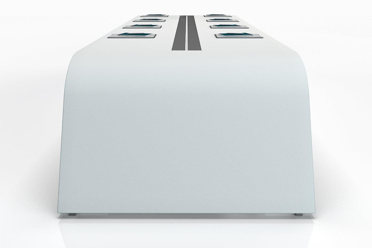 Side view of long solid surface conference table for creative meeting rooms with seamless acrylic solid surface finish