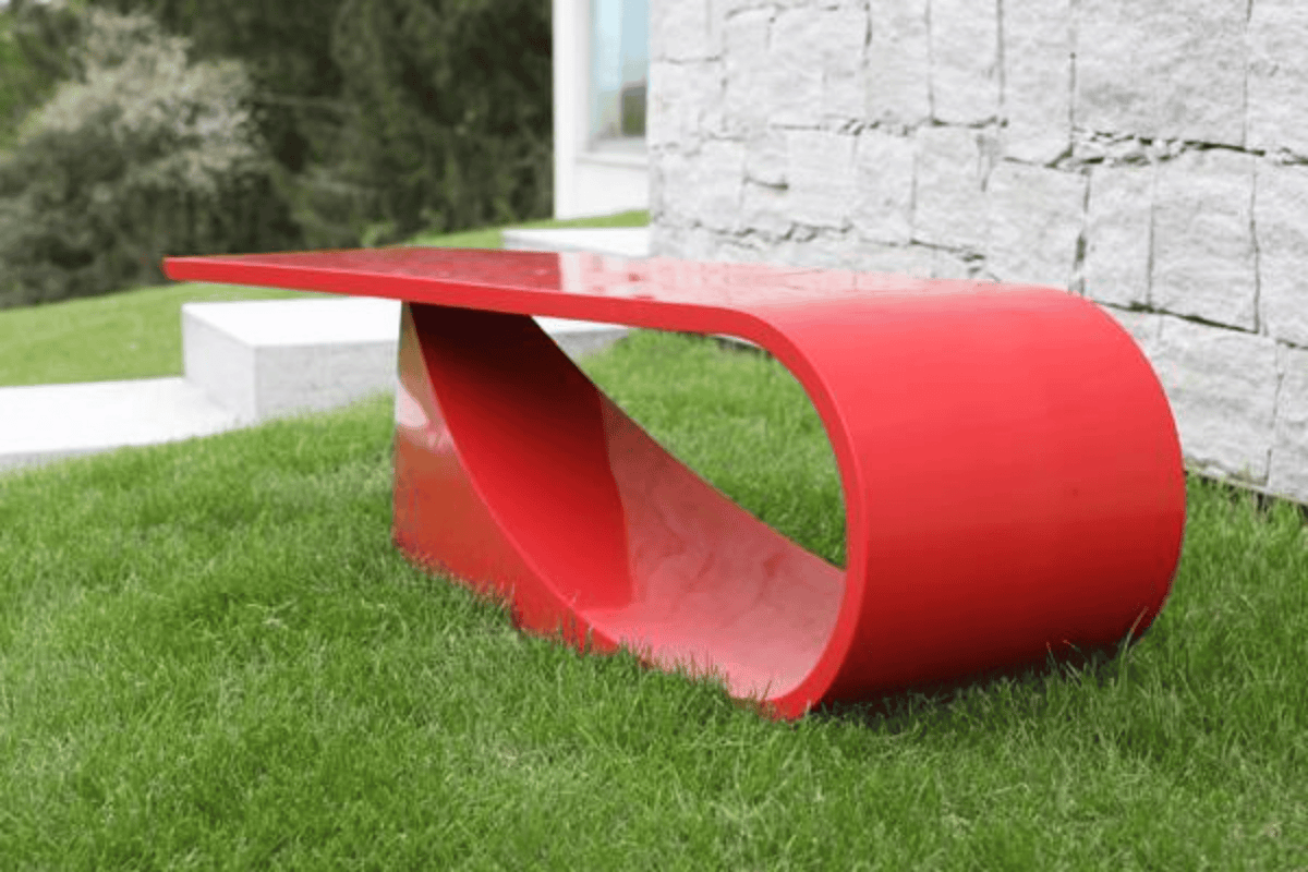 Red Sculptural Solid Surface Executive Desk for Creative Offices in acrylic solid surface for custom B2B project furniture