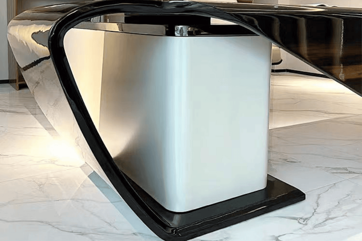Side view of technology style solid surface executive desk for modern offices with seamless acrylic solid surface finish