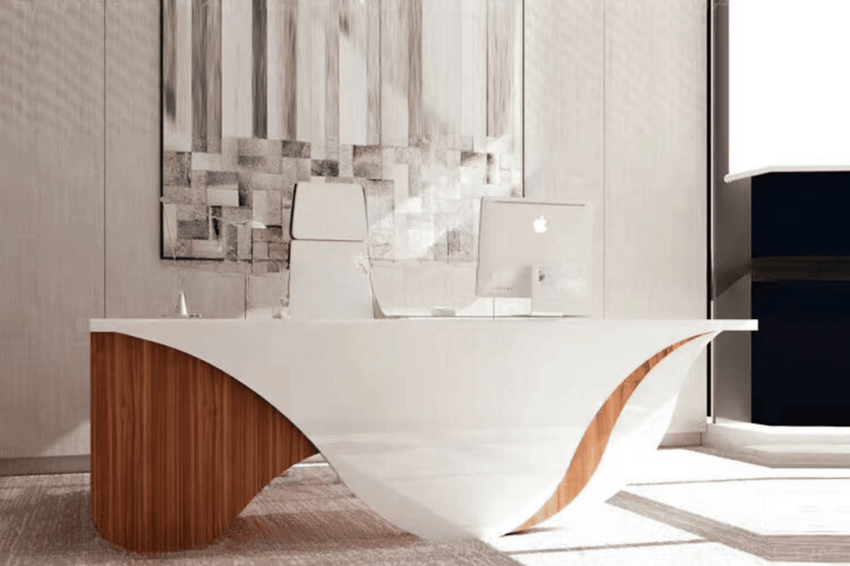 Side view of white l-shaped solid surface manager desk for executive offices with seamless acrylic solid surface finish