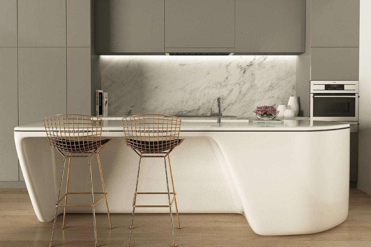 Side view of modern white solid surface kitchen island counter with seamless acrylic solid surface finish