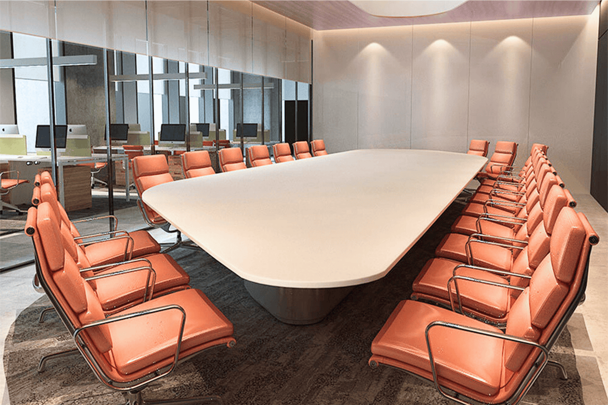 White solid surface conference table for an office meeting room