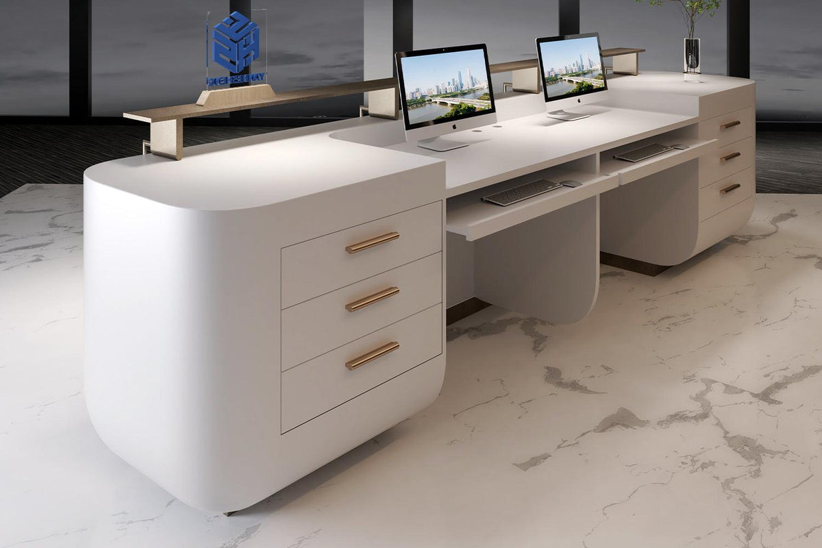 Side view of white and gold solid surface reception desk for hotels and beauty salons with seamless acrylic solid surface finish