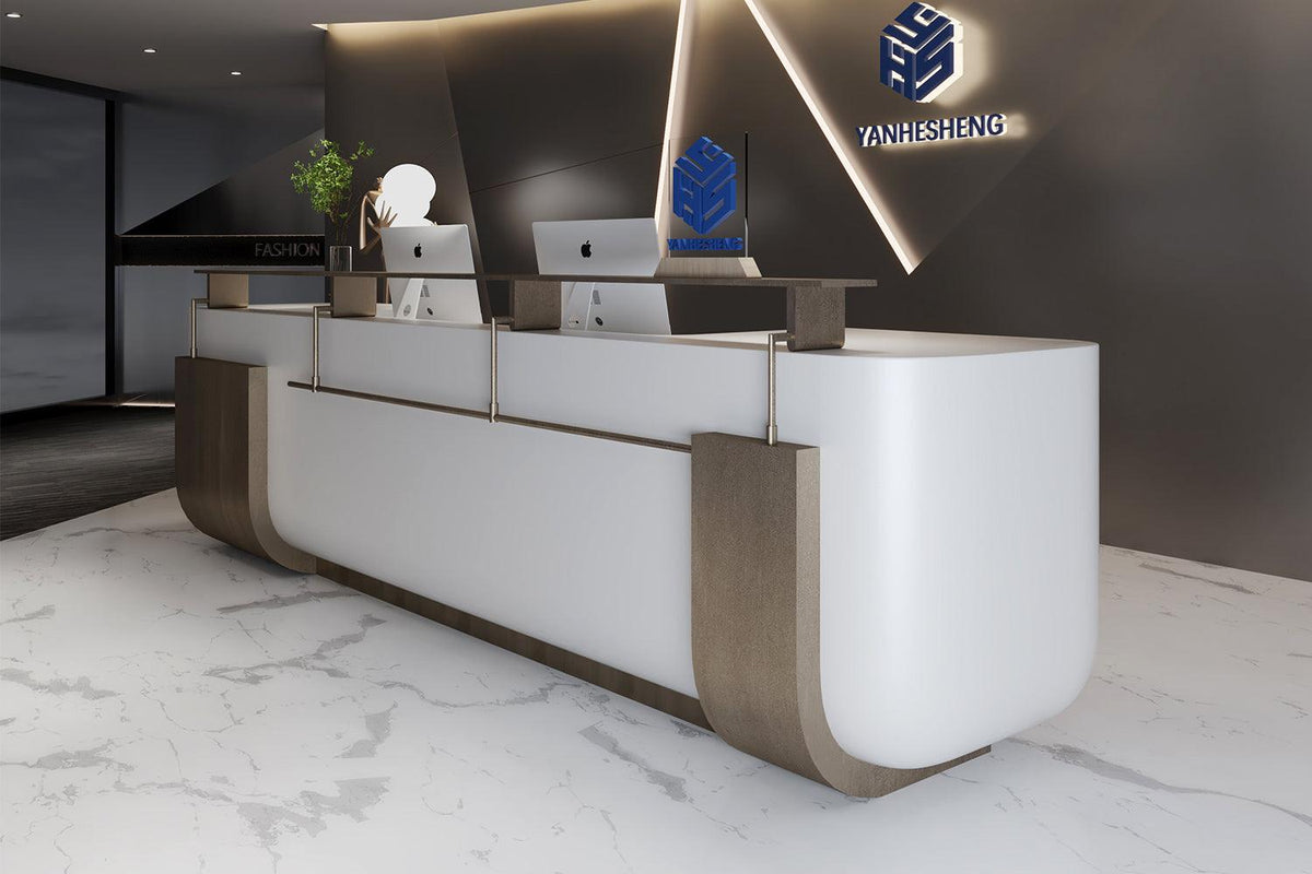 Side view of white and gold solid surface reception desk for hotels and beauty salons with seamless acrylic solid surface finish