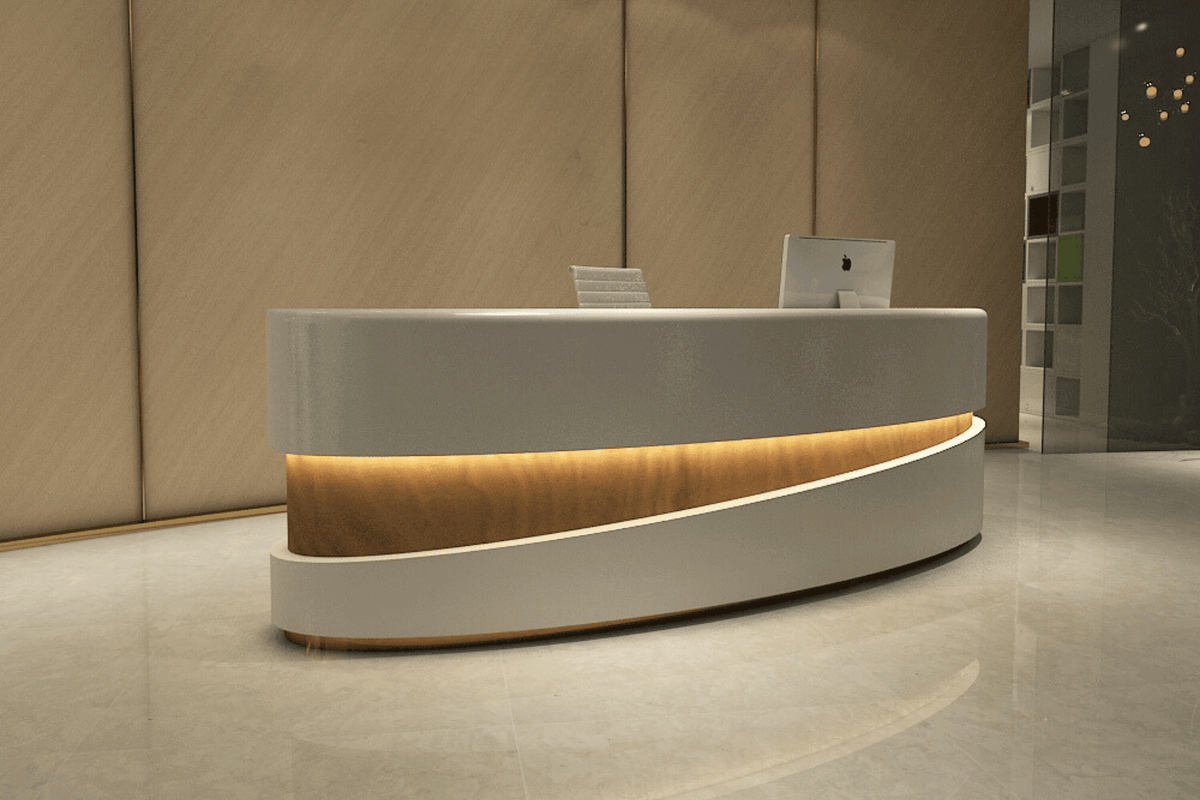 Side view of half-round solid surface reception desk for 2-person offices with seamless acrylic solid surface finish