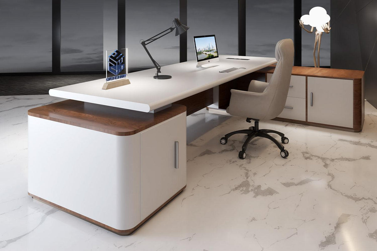 Side view of white l-shaped solid surface executive desk with seamless acrylic solid surface finish