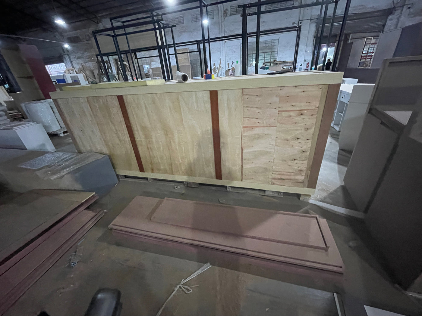 Custom counter protected with a timber transport frame in a workshop