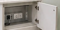 Concept illustration of an open furniture access panel and service interface; equipment and final connections follow the agreed project scope.
